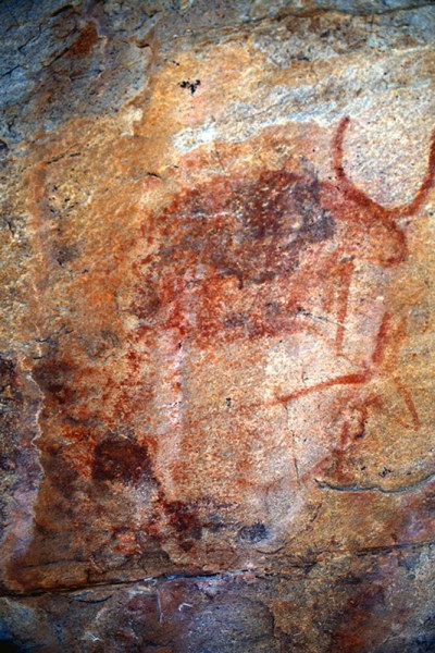 Tsodilo Hills. Cow with red outline in-filled in red above outline antelope. Image ID: bottsd0710001