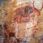 Tsodilo Hills. Cow with red outline in-filled in red above outline antelope. Image ID: bottsd0710001