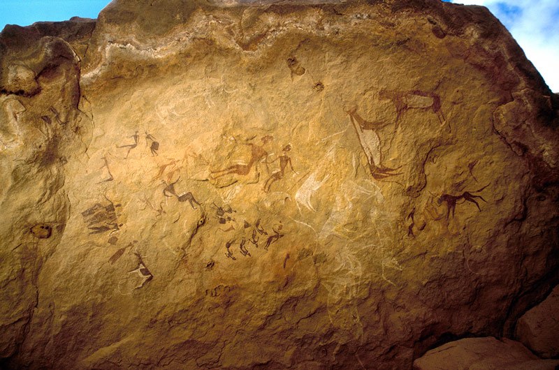 Karkur Tahl. Looking directly up at panel of paintings on underside of projecting rock shelf. Paintings, either late Pastoral or Horse Period include bichrome red and white cattle. Image ID: egykta0020002