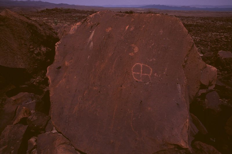 Turkana. On boulder separated from Altar Rock. Crude pecked circle containing cross. Image ID: kentur0050001