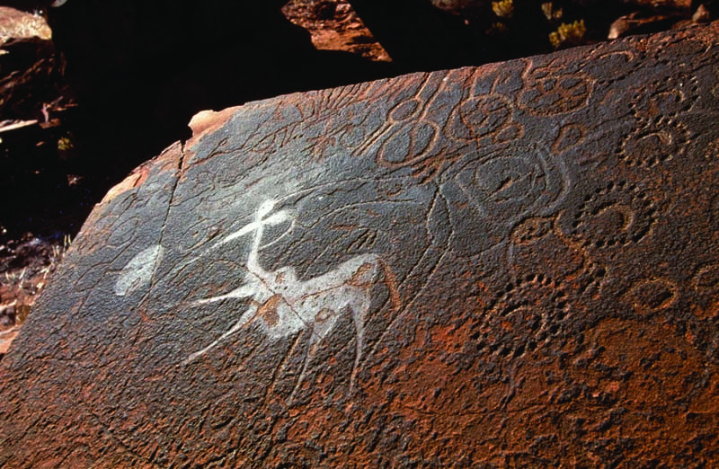 The dancing (and pregnant) kudu of Twyfelfontein, amid pecked geometric designs