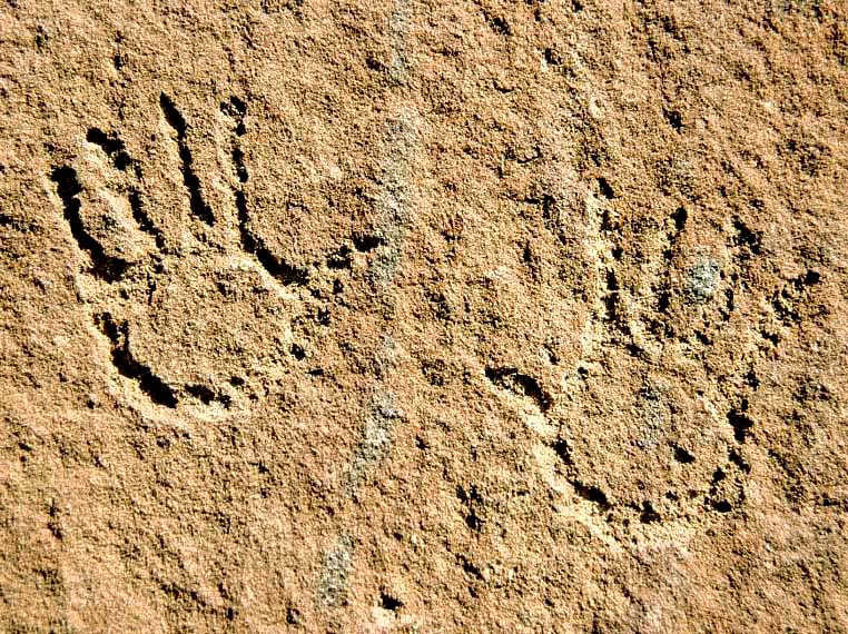 Pecked engraving of hands