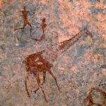 Djaba, Niger. Giraffe and two running men. Image ID: nigdjd0050012
