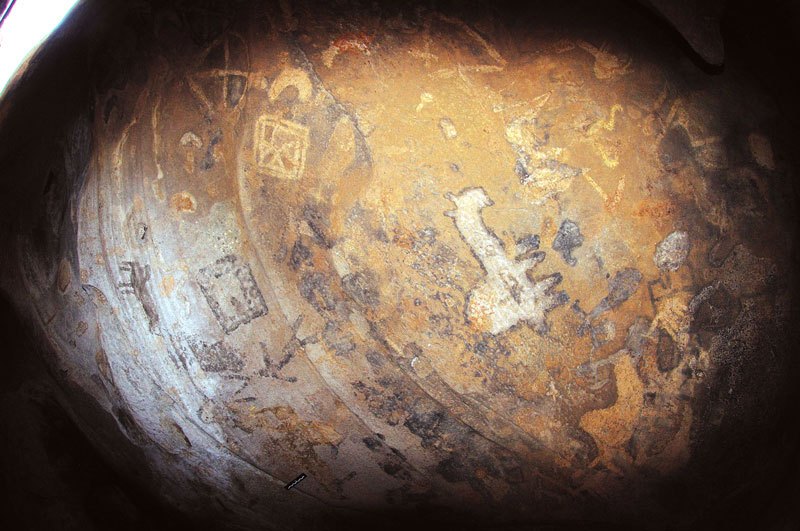 Dhayamole. From top, black, upside-down animal. Black, striding figures. Decorated square. Black animals. Orange and black animals. Orange oval containing cross. Image ID: somdha0020033