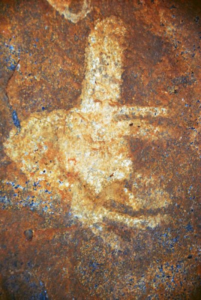 Dhayamole. Silhouette, white animal with large hump (camel?).Image ID: somdha0020040