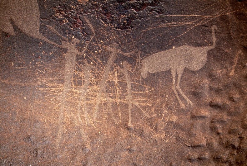 Engravings of human figures with an ostrich. Possible hunting scene. Note the damage to the engravings through vandalism, SOANTC0050017