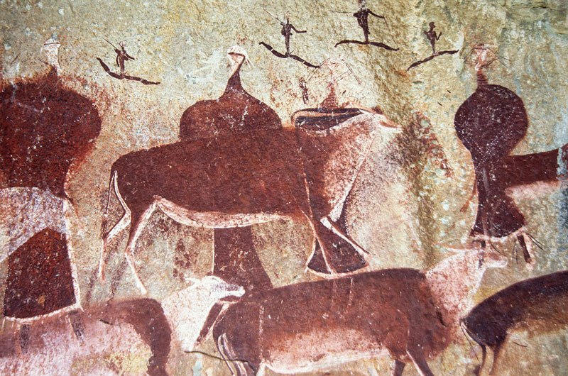 Drakensberg, South Africa. Coloured shapes and areas of red have been superimposed by more recent and easily discernable images. Note superimposed faded body and legs of antelope protruding from behind central eland. Image ID: soadrb0080013