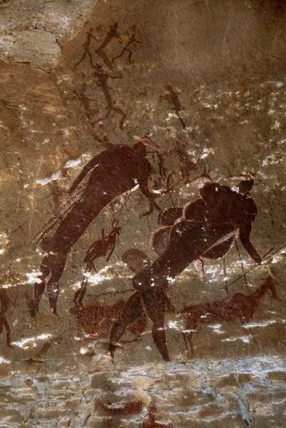 Drakensberg, South Africa. Cloaked human figure leaning right with white face and hoofs for feet. Image ID: soadrb0110028
