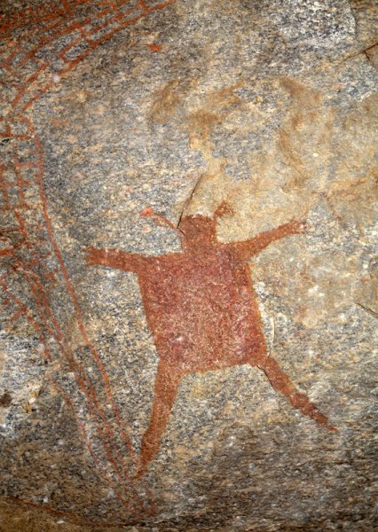 Anthropomorphic figure with possible animal’s ears. Arms spread and fingers extended. Image ID: tankon0030049