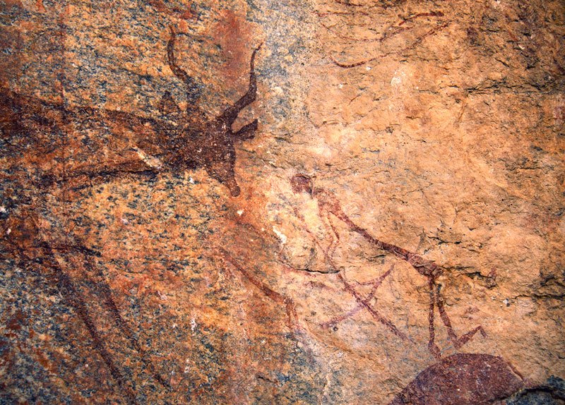 Head of kudu bull, antelope, schematic man with elongated body and man holding bow. Possible arrow piercing kudu’s chest. Image ID: tankon0130011