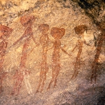 Six of standing figures in line of nine figures. Image ID: tankon0100014