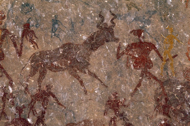 Mashonaland, Zimbabwe. Red people and male kudu. Note orange figure superimposing man’s arm and delicate white decoration on bottom figures. Image ID: zimmsl0230034