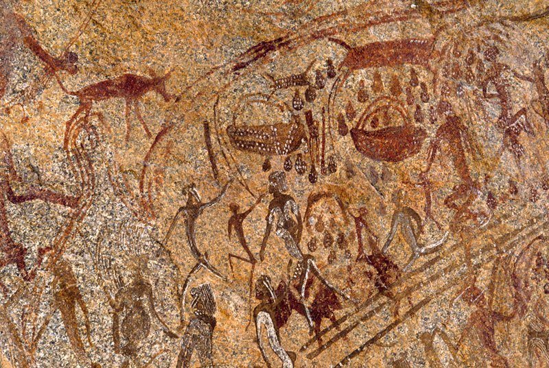 Mashonaland, Zimbabwe. Curved bands of parallel lines (strings?). Dog facing right with hind leg over summit of curved strings. Grey woman at bottom left with breasts(?), swollen stomach, and fine lines rising from back and head. Highly decorated people wearing wigs. Image ID: zimmsl0260018